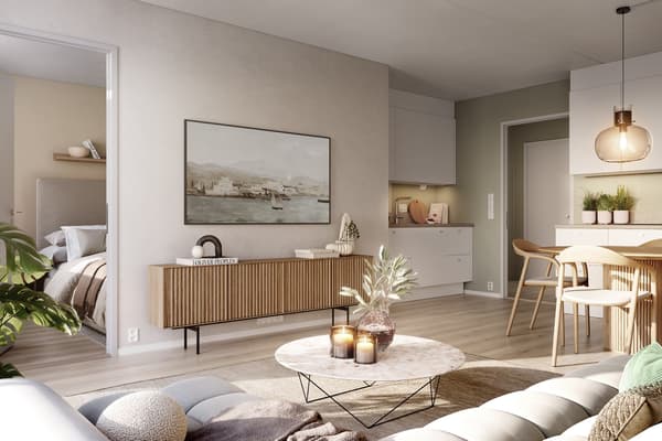 Praktisk oppdeling av kjøkken gjør at man får bedre plass til spisebord. Merk at bilde viser speilvendt leilighet og et annet konsept enn det som er valgt på denne boligen.